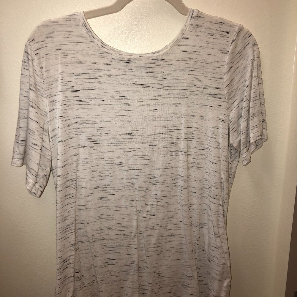 Speckled black and white top